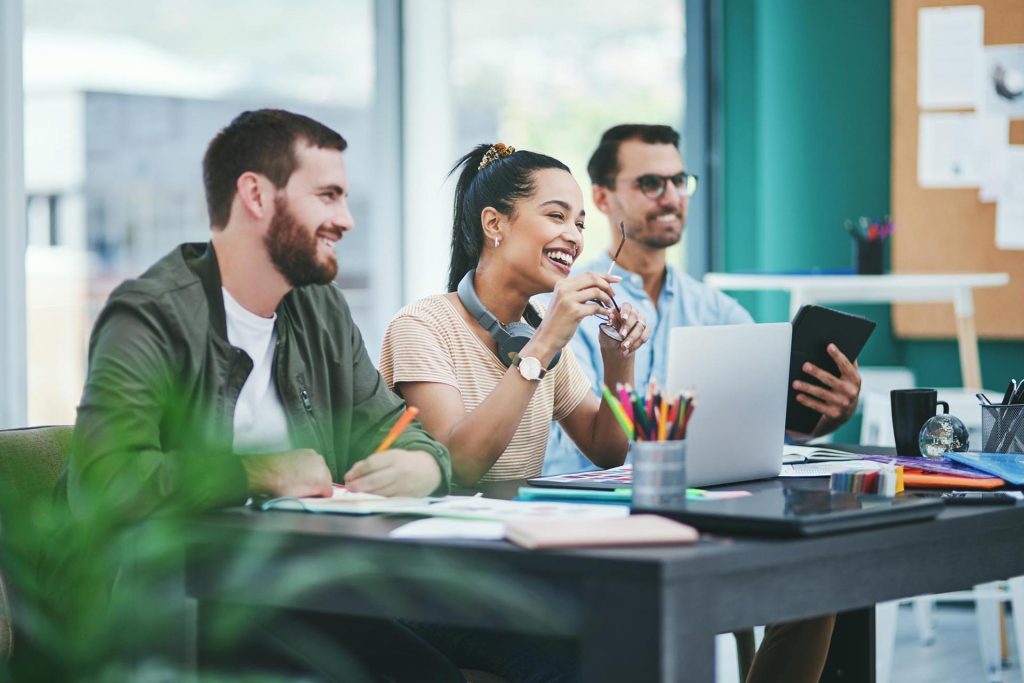 Team of digital marketing professionals collaborating in a modern office environment